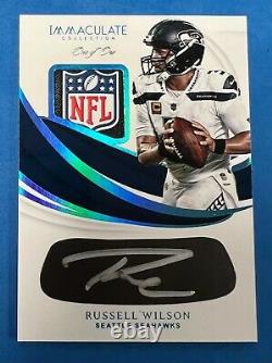 2019 Immaculate Russell Wilson Eye Black NFL Shield Patch Auto #1/1