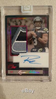 2019 Panini One Patch Autograph #121 Russell Wilson Logo Patch Auto Seahawks 1/4