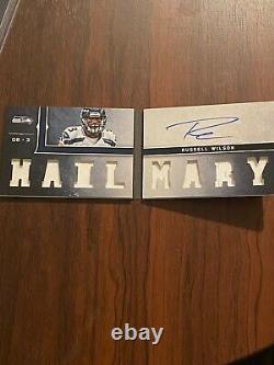 Russell Wilson 2012 Playbook Rookie on card Auto with Jersey Booklet 43/99