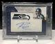 2012 Russell Wilson Panini Prominence Auto Rookie Team Logo Patch Seahawks